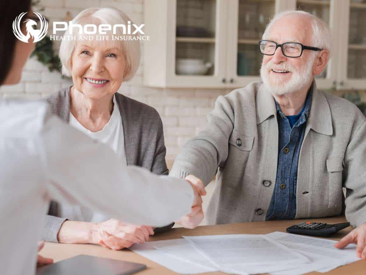 Senior couple discussing Medicare Part D options with an advisor